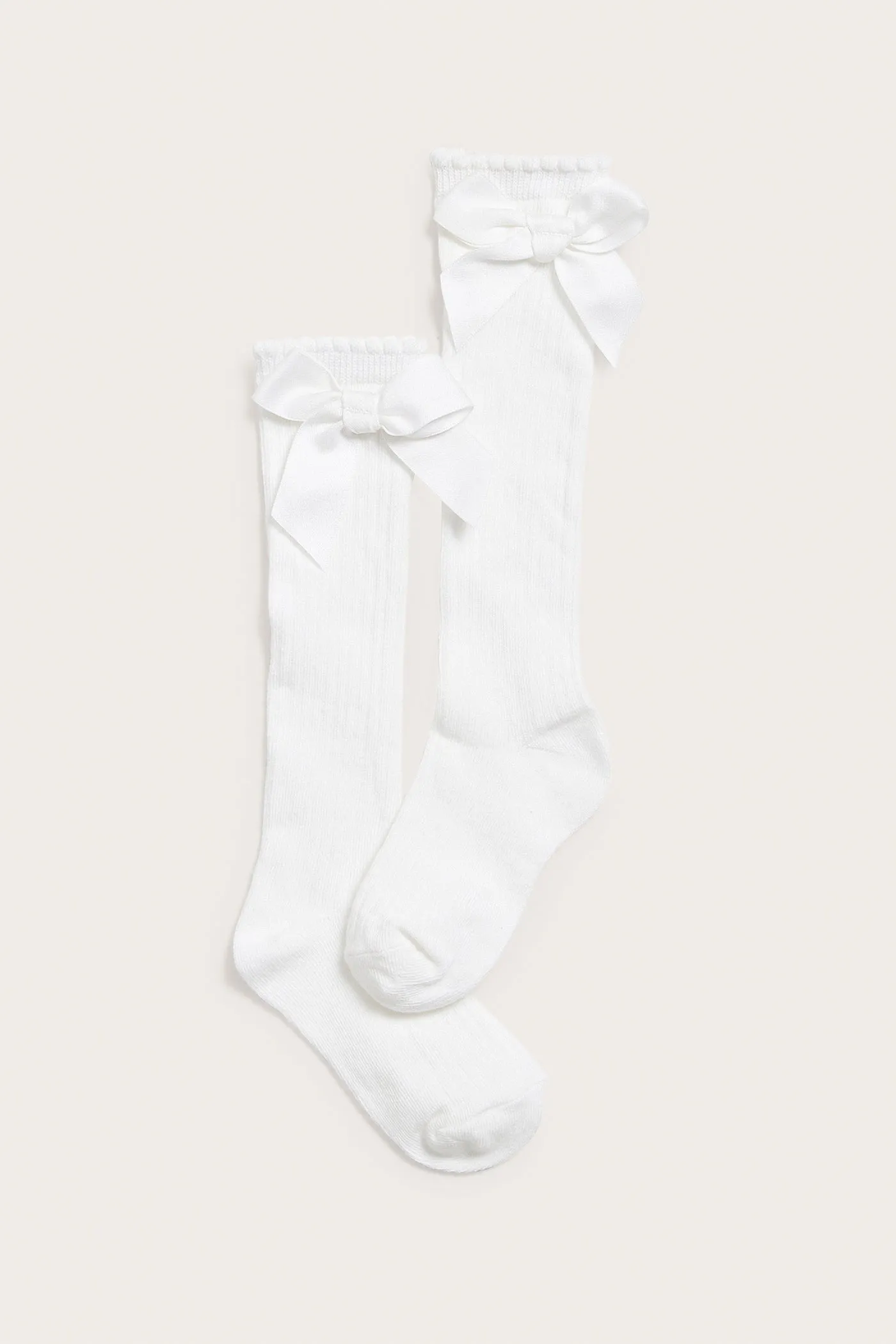 Kids white knee-high bow socks