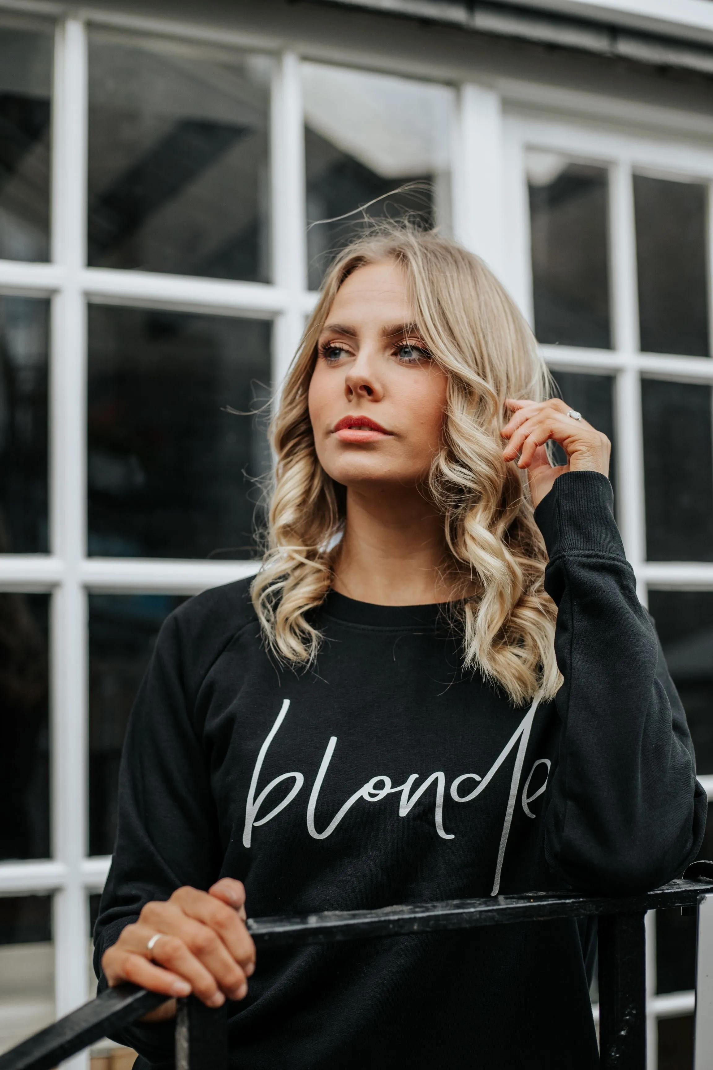 White blonde on black sweatshirt *fitted style*